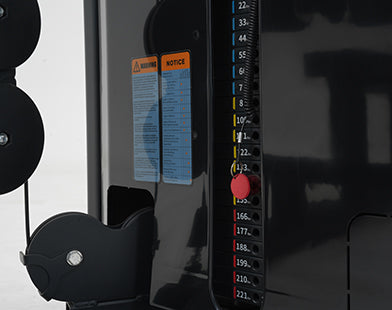 Close-up of a Insight Fitness Lat Pull Down and Mid Row - SA026 with various buttons and labels on a dark background